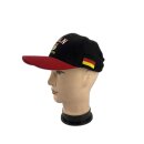 Basecap Köln mit Stickerei Köln-Wappen und Germany Schrift, Schwarz mit rotem Schirmrand